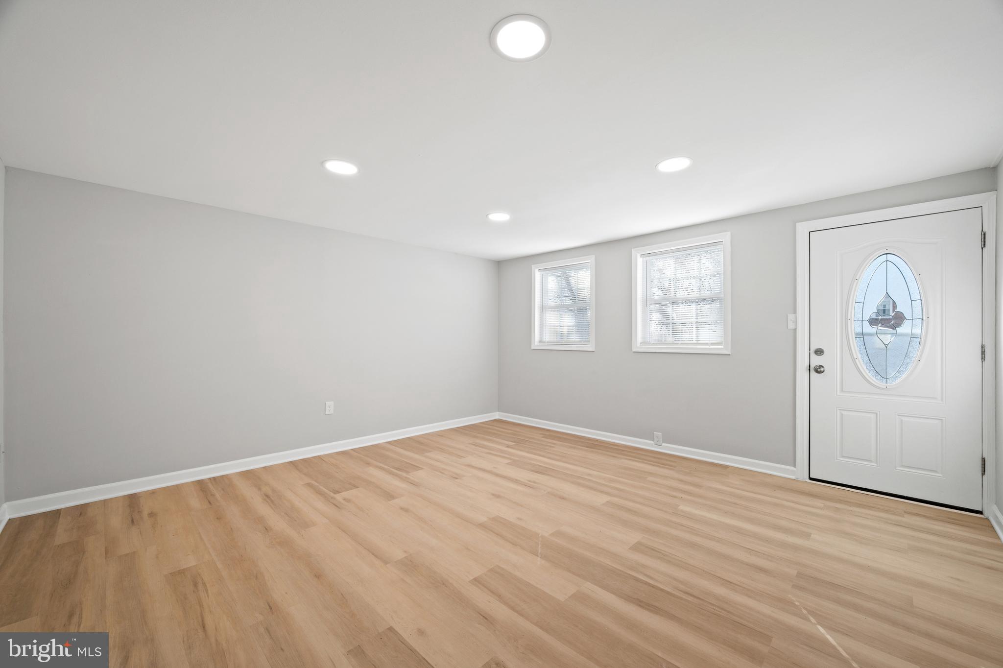 817 5th Baltimore, MD 21227 - Photo 2 of 29 an empty room with windows and closet