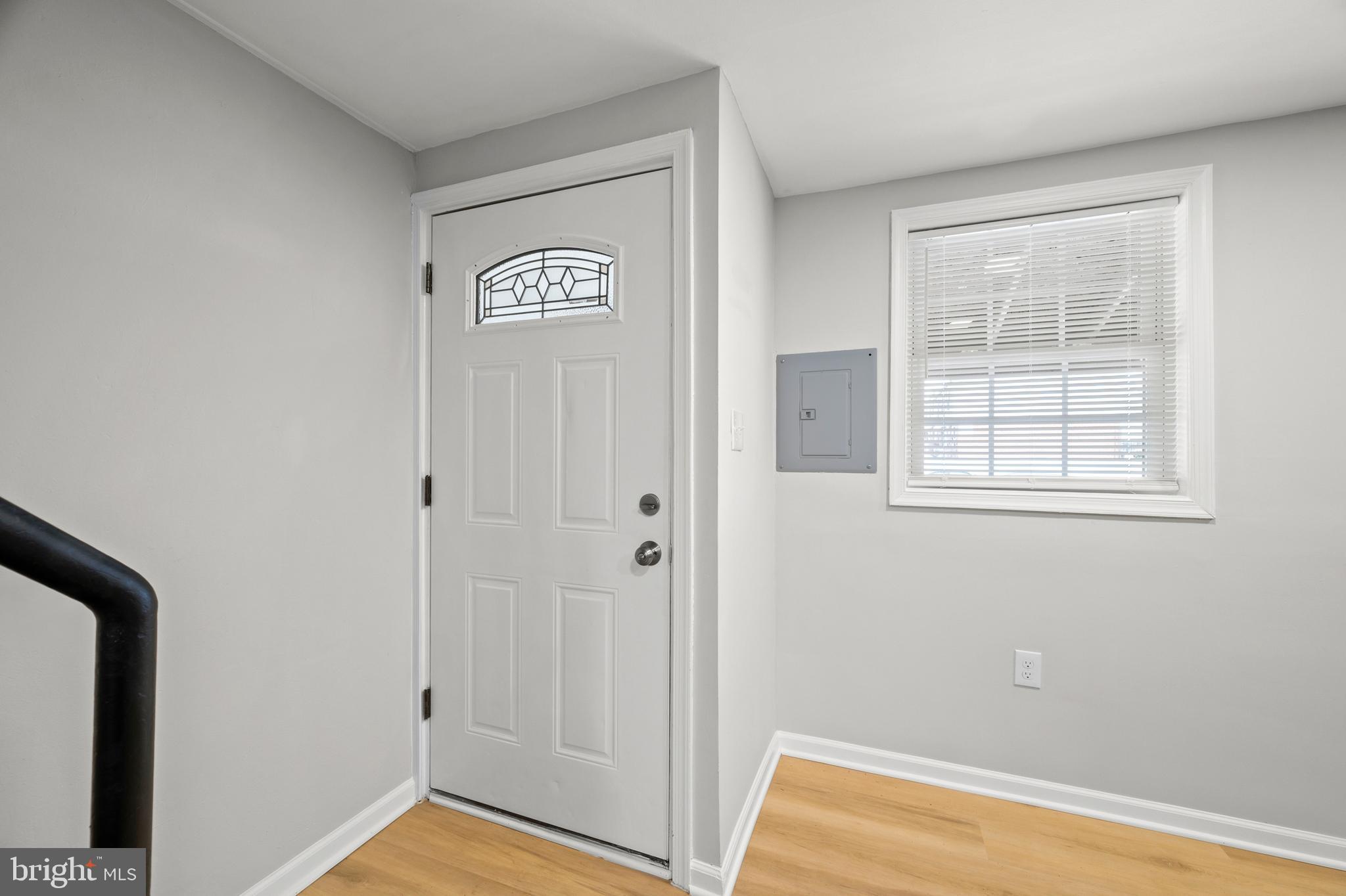 817 5th Baltimore, MD 21227 - Photo 25 of 29 a view of an entryway with wooden floor