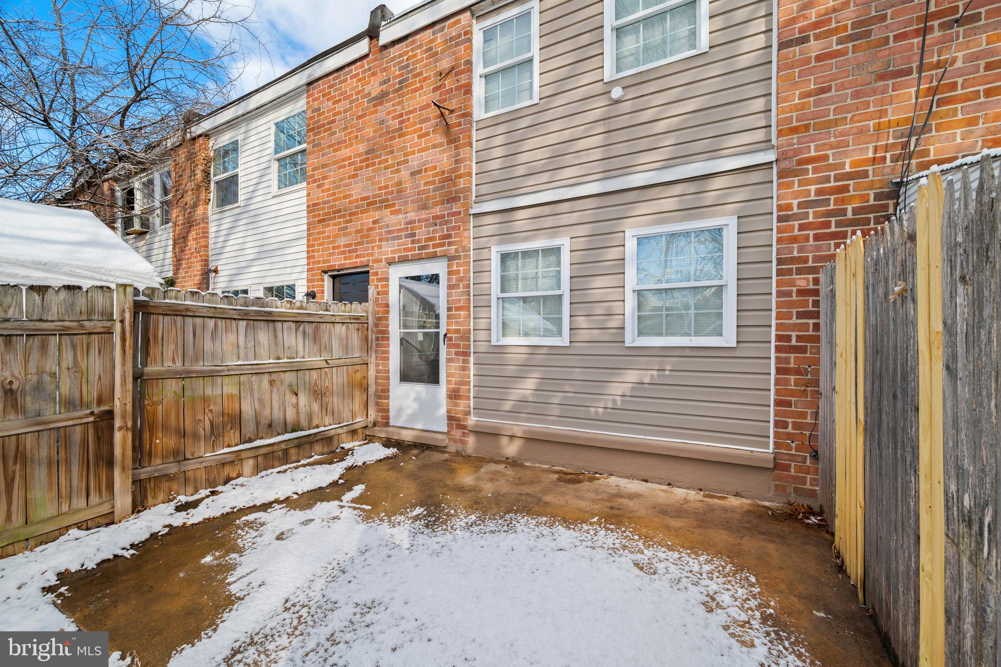 817 5th Baltimore, MD 21227 - Photo 28 of 29 a view of a house with a wooden fence