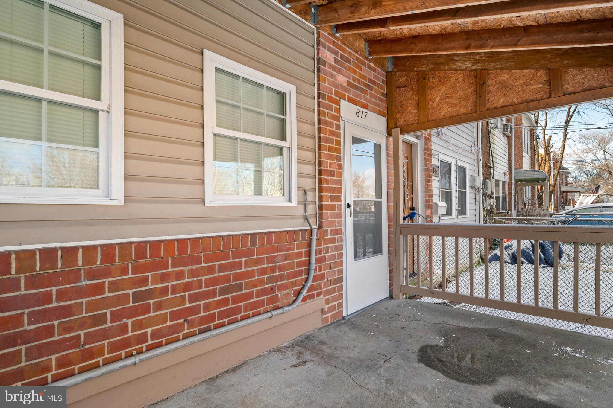 817 5th Baltimore, MD 21227 - Photo 8 of 29 a view of a porch with a bench