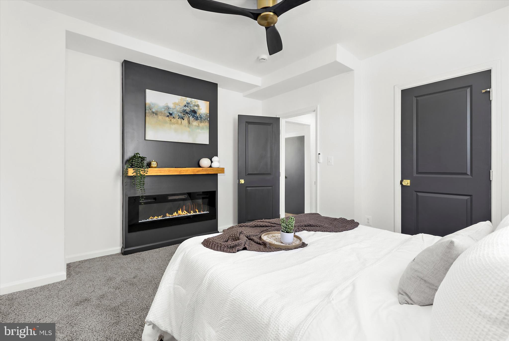 5313 Elsrode Avenue Baltimore, MD 21214 - Photo 21 of 60 Master Bedroom with Electric Fireplace