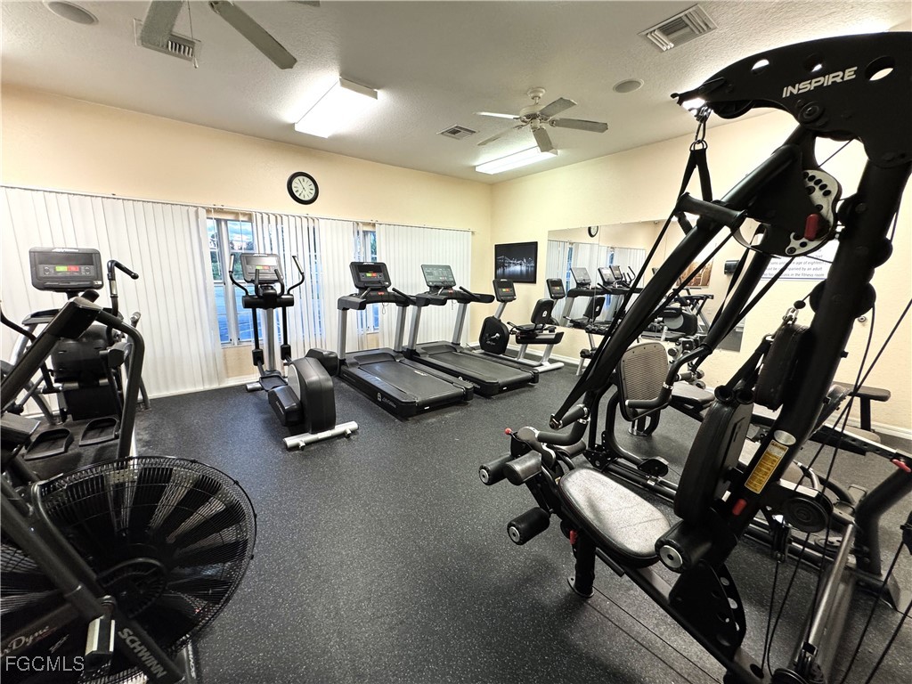 8423 Bernwood Cove Loop, Unit 410 Fort Myers, FL 33966 - Photo 37 of 39 a view of a room with gym equipment