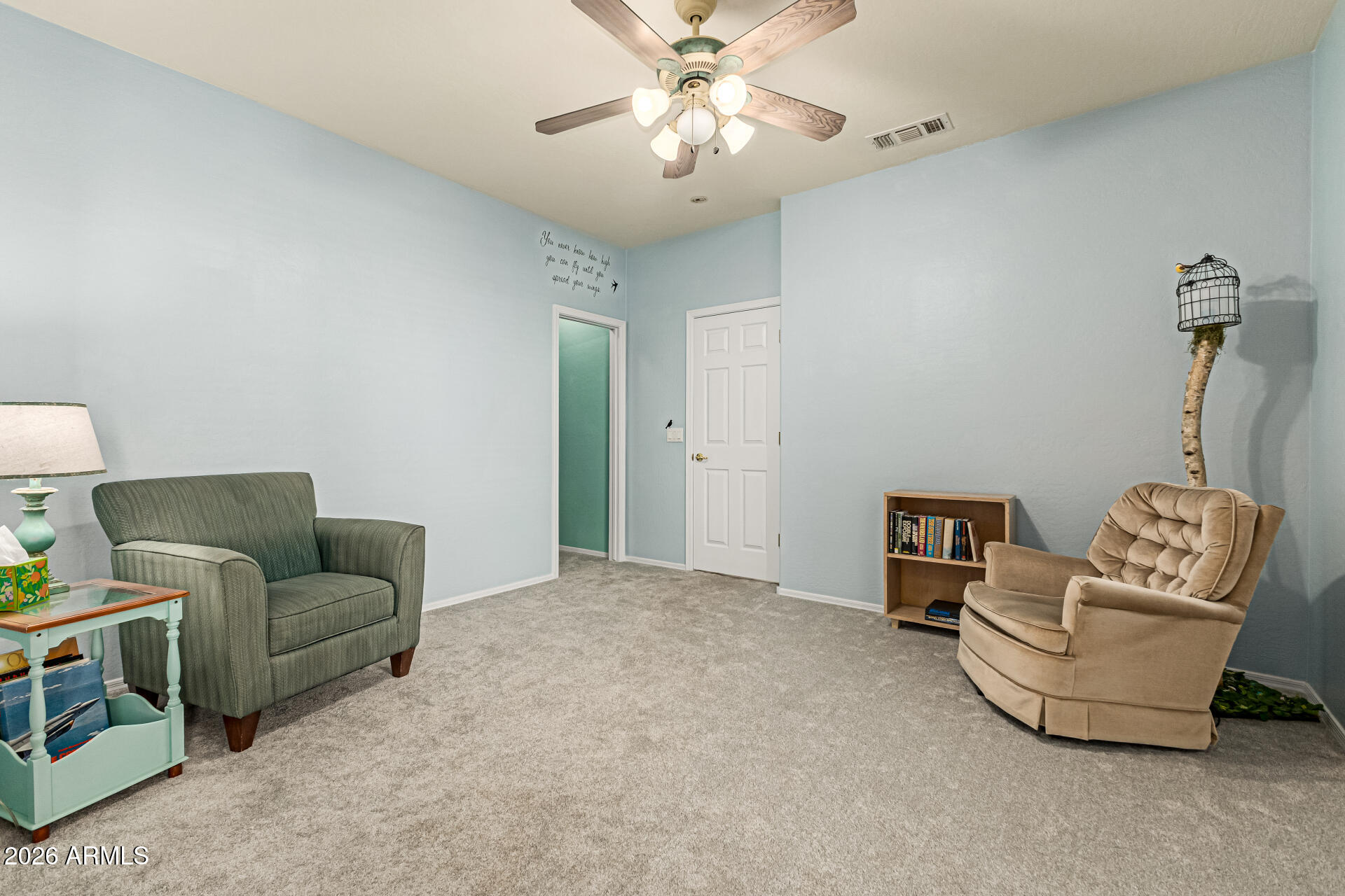 2326 South Porter Street Gilbert, AZ 85295 - Photo 11 of 29 a living room with furniture and a chandelier