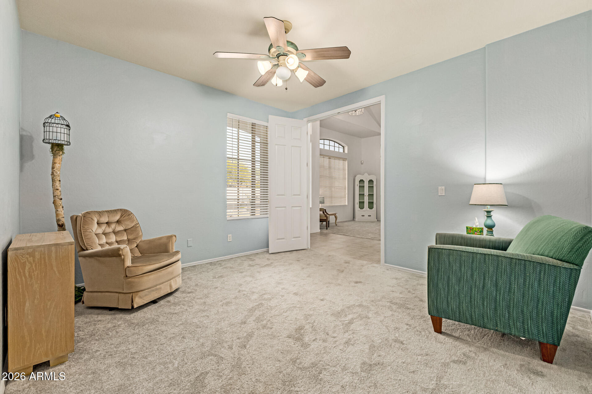 2326 South Porter Street Gilbert, AZ 85295 - Photo 12 of 29 a living room with furniture and a window