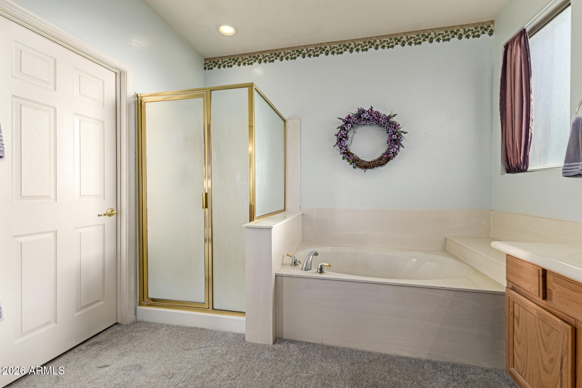 2326 South Porter Street Gilbert, AZ 85295 - Photo 24 of 29 a bathroom with a bathtub and a shower