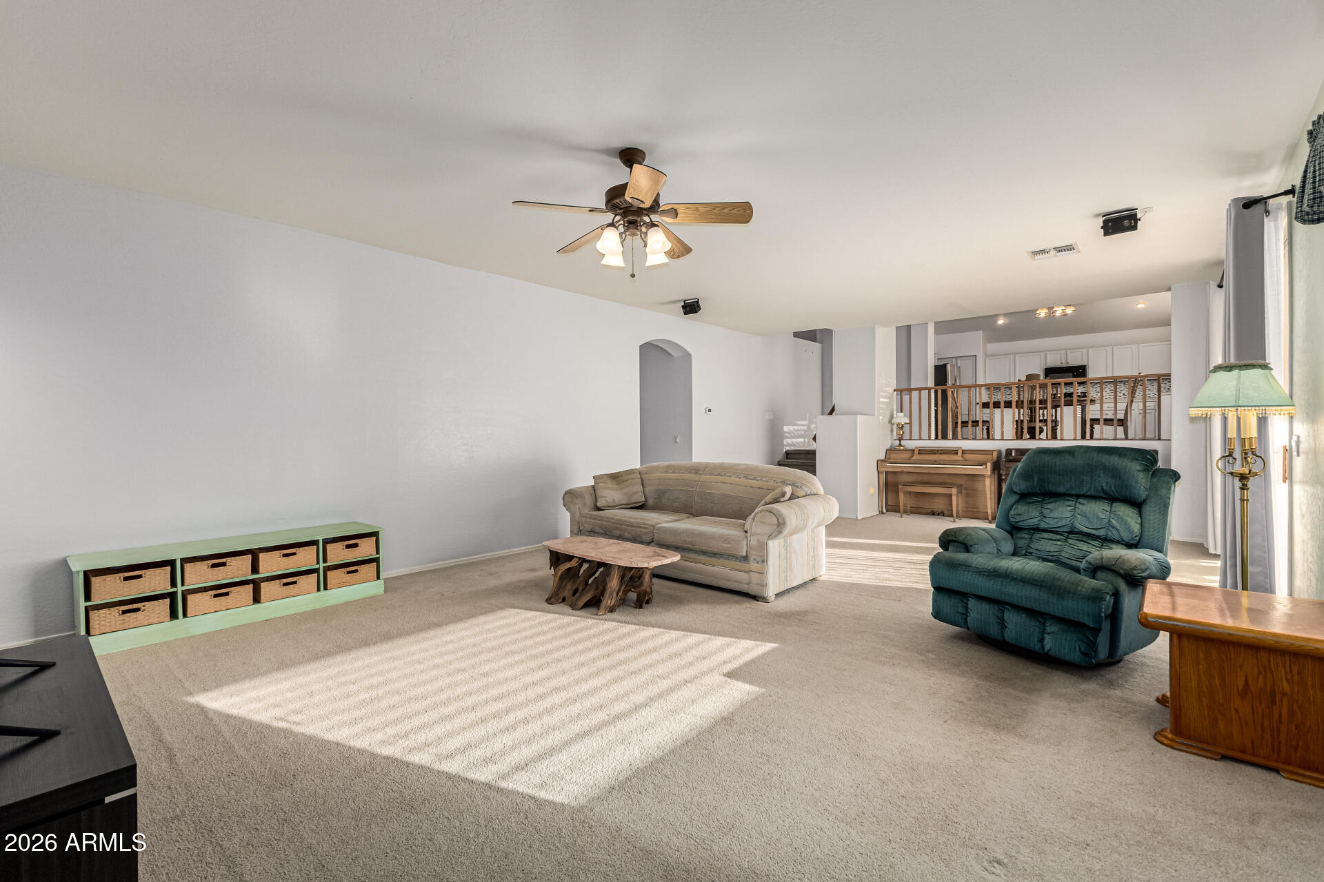 2326 South Porter Street Gilbert, AZ 85295 - Photo 9 of 29 a living room with furniture and a chandelier