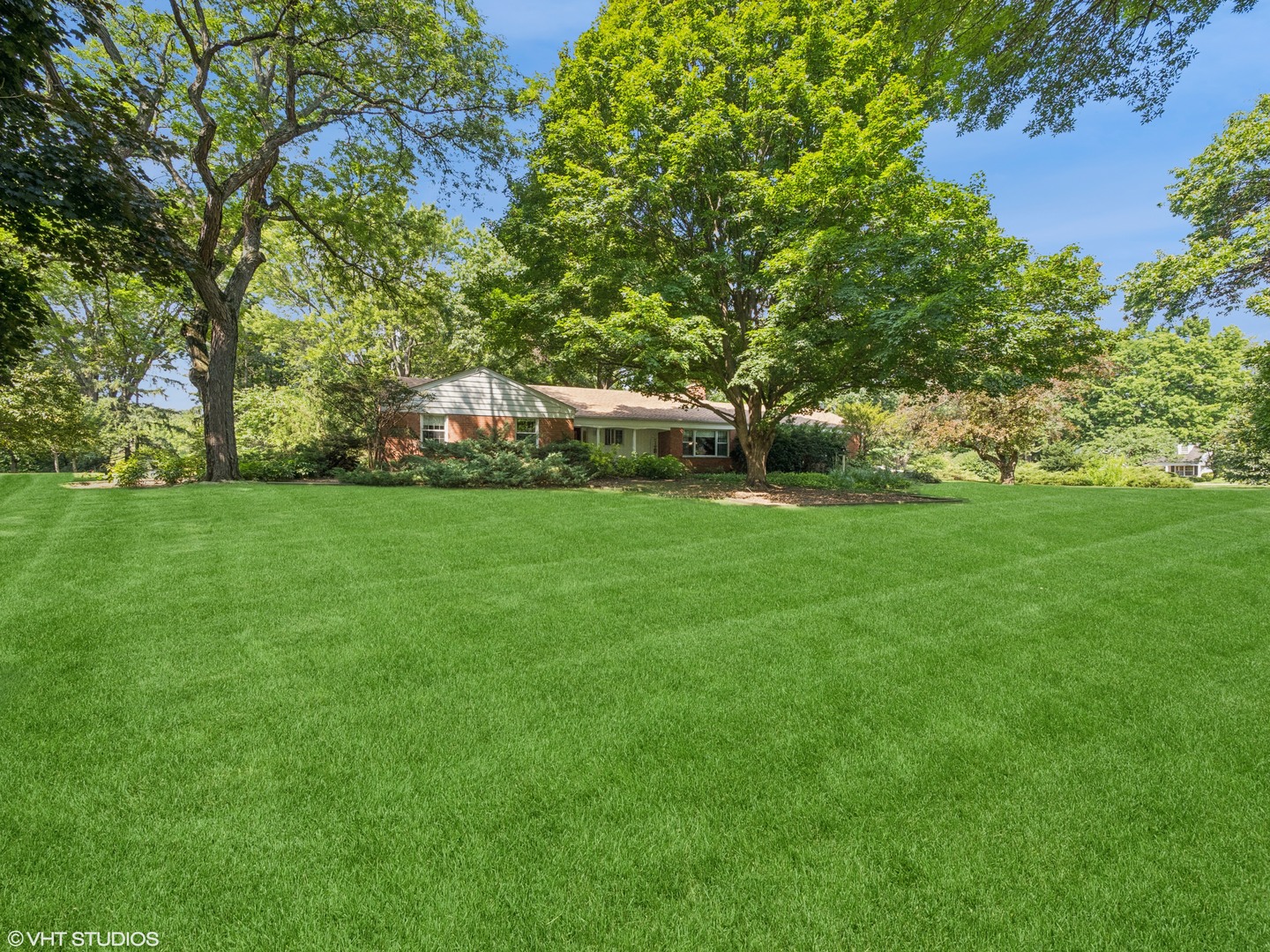1881 West Tweed Road Inverness, IL 60067 - Photo 2 of 22 a view of a field of grass and trees