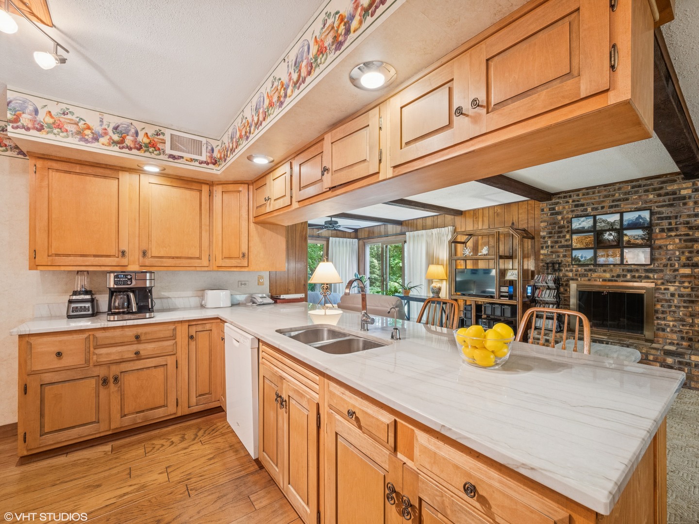 1881 West Tweed Road Inverness, IL 60067 - Photo 7 of 22 a kitchen with a sink a stove and cabinets