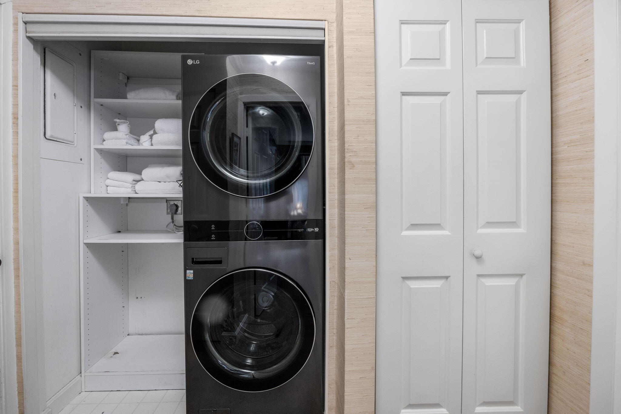 23 Landing Lane, Unit 23 Brewster, MA 02631 - Photo 13 of 33 a close view of a utility room with dryer and washer