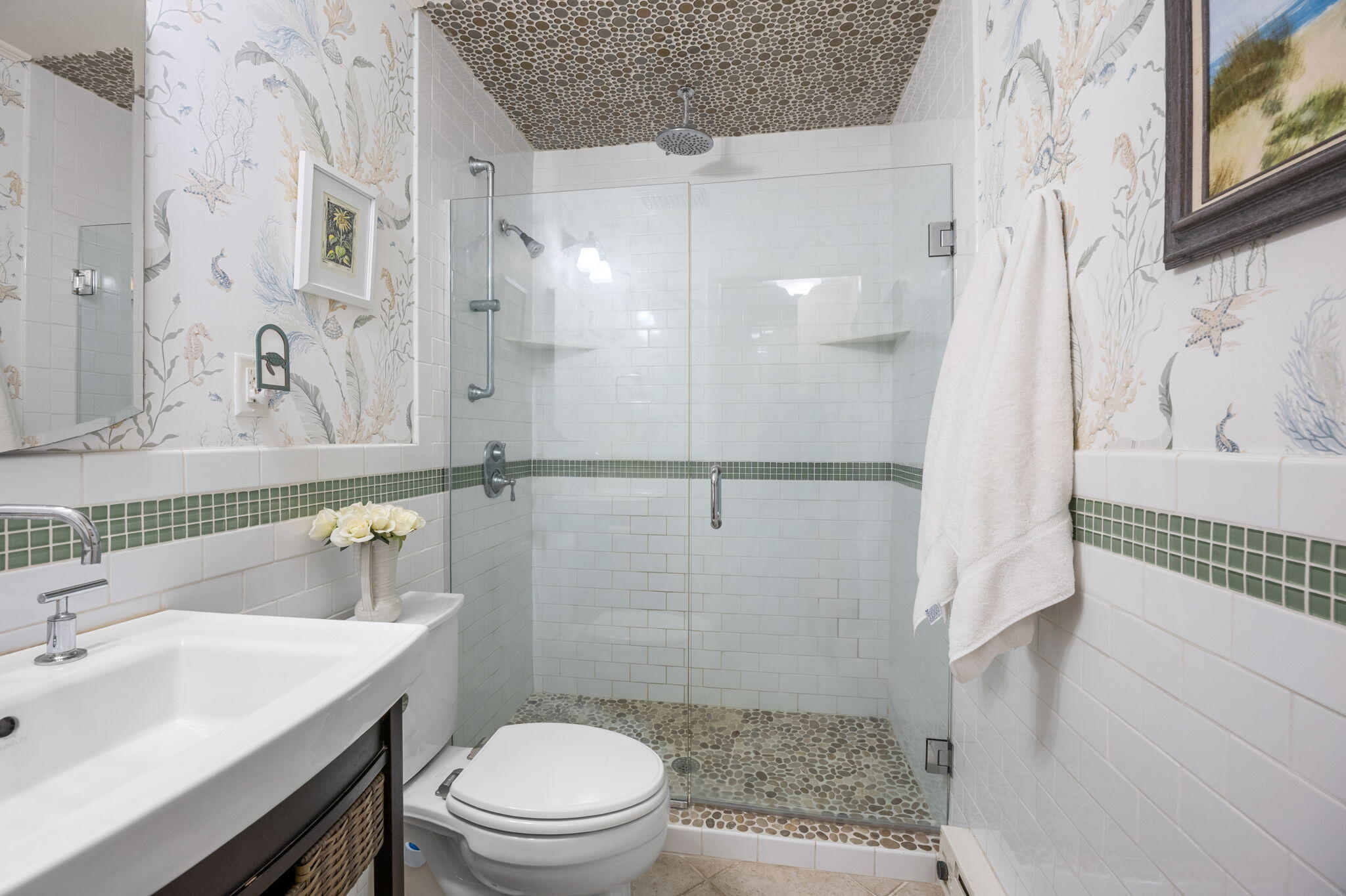 23 Landing Lane, Unit 23 Brewster, MA 02631 - Photo 17 of 33 a bathroom with a sink a toilet and shower