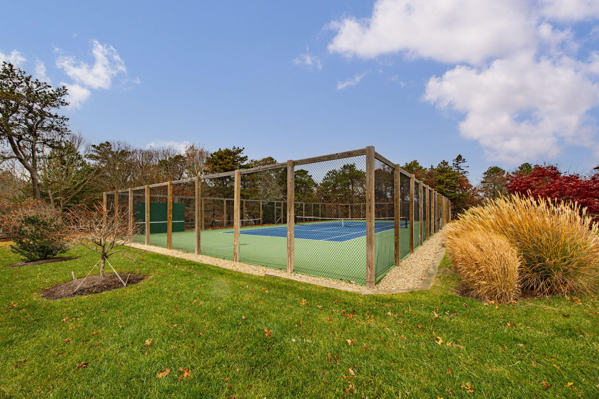 23 Landing Lane, Unit 23 Brewster, MA 02631 - Photo 28 of 33 a view of a garden with a slide