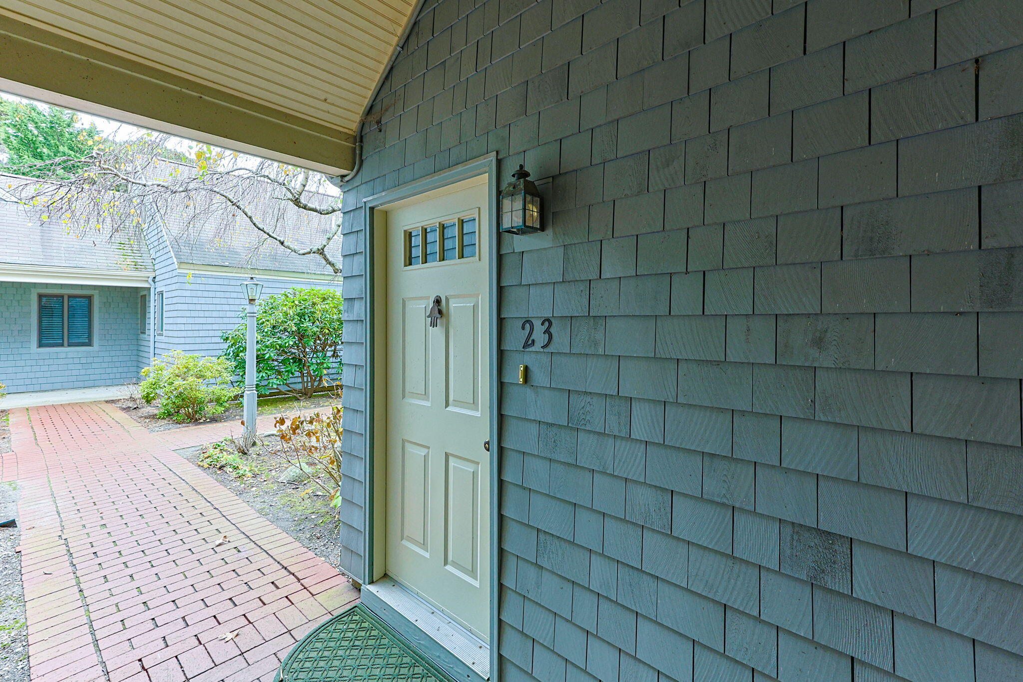 23 Landing Lane, Unit 23 Brewster, MA 02631 - Photo 3 of 33 a bathroom with a shower and a sink