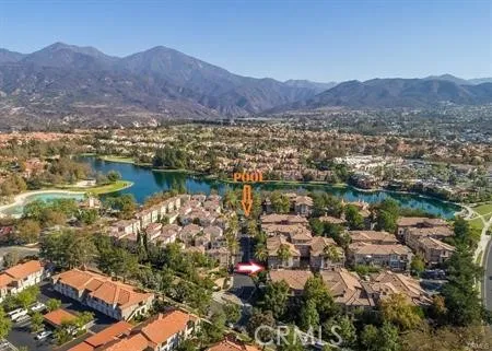 a view of a city with mountains in the background