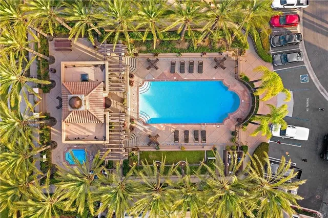 a view of a swimming pool with a patio
