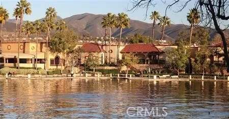 a large kitchen with a refrigerator and a stove