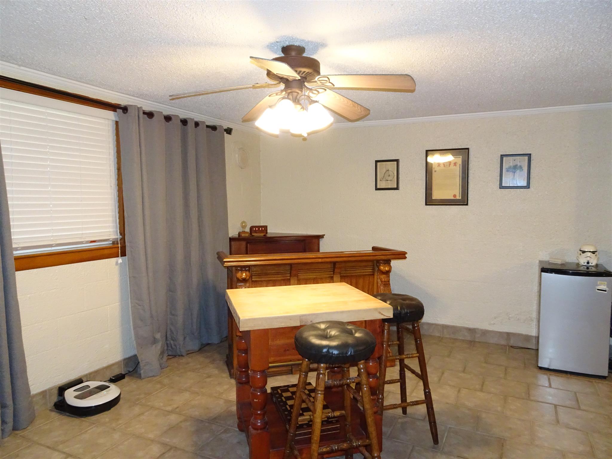 2143 Post Road Clarksville, TN 37043 - Photo 13 of 19 a view of a dining room with furniture and a chandelier fan