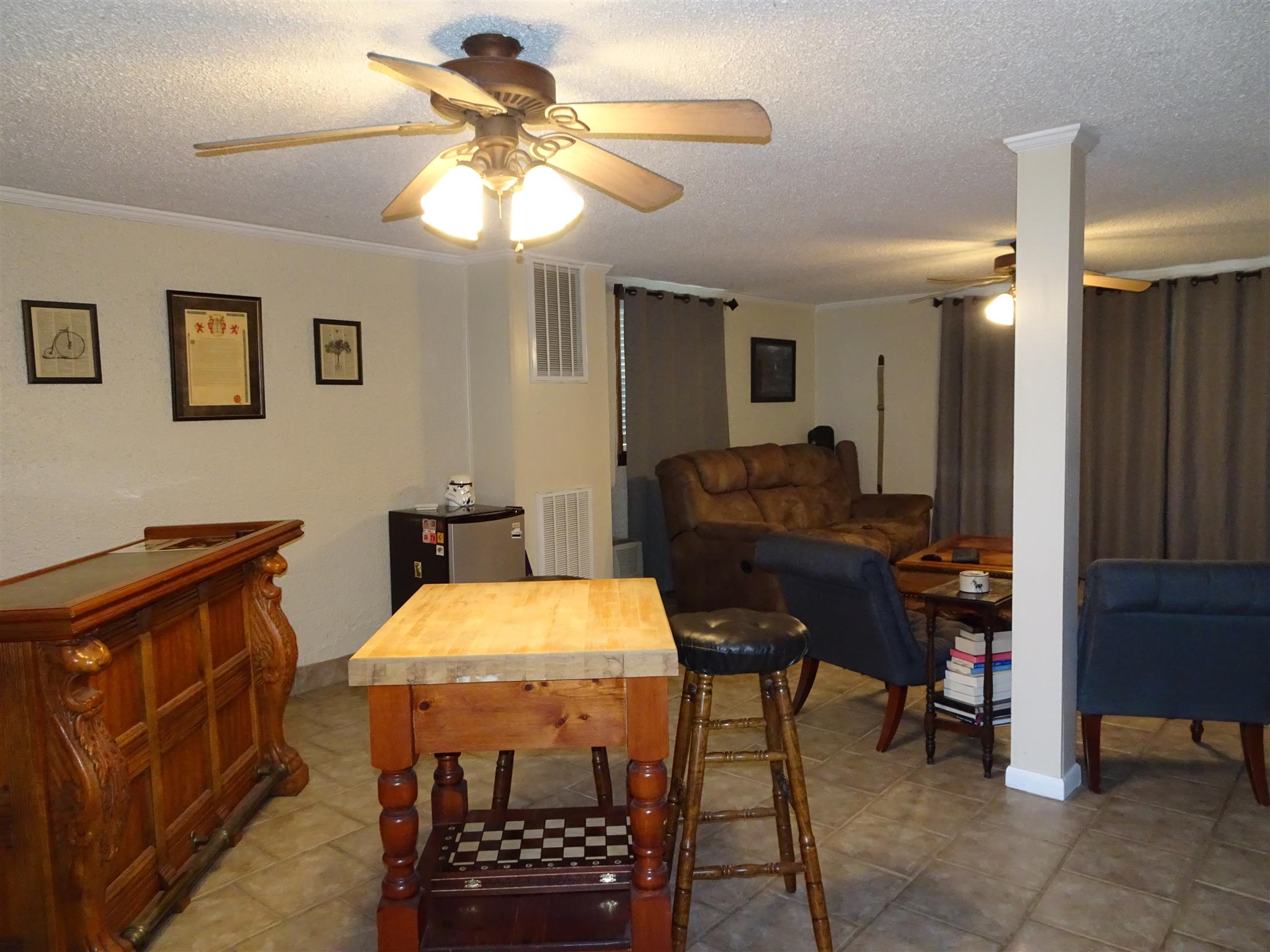 2143 Post Road Clarksville, TN 37043 - Photo 14 of 19 a room with furniture and a chandelier