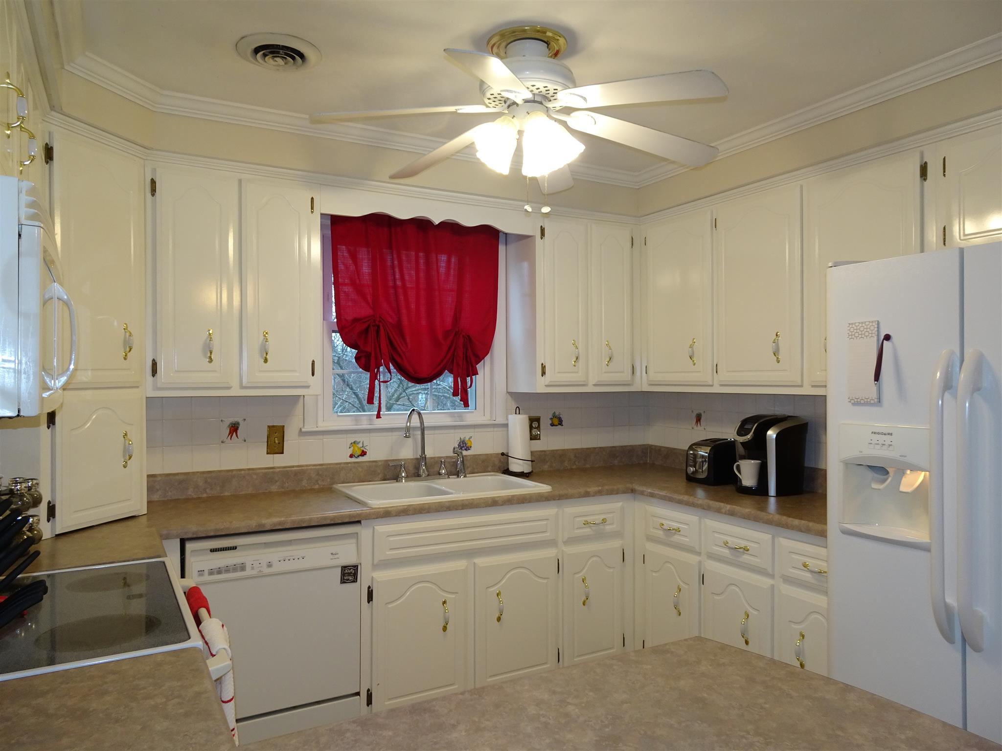 2143 Post Road Clarksville, TN 37043 - Photo 5 of 19 a kitchen with a sink cabinets and window