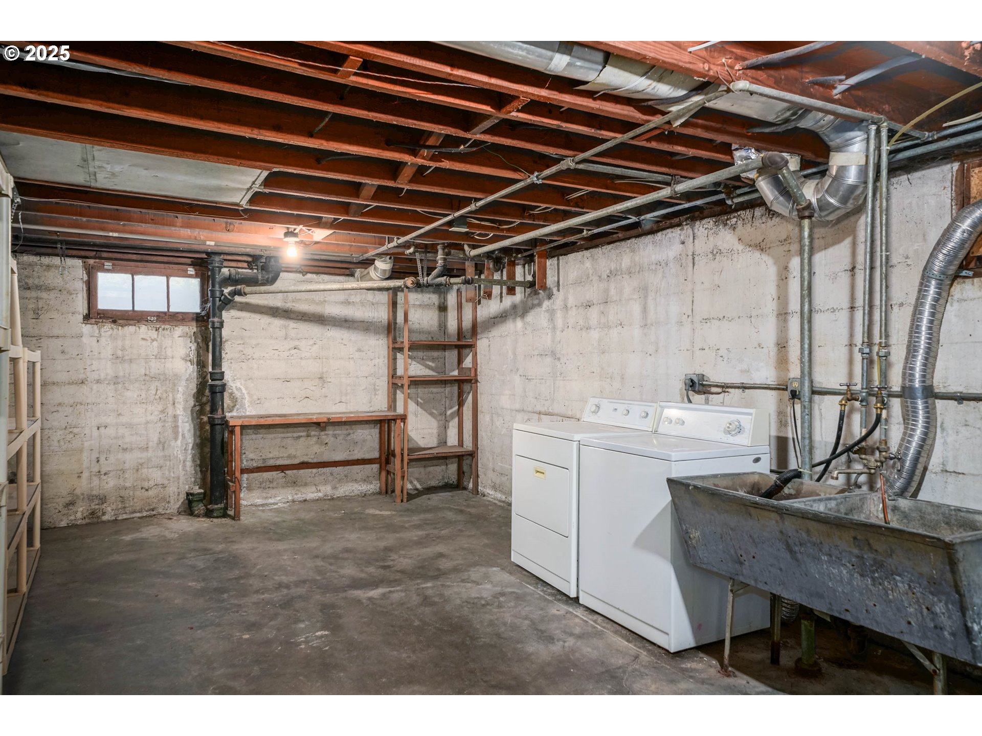 1908 Northeast 72nd Avenue Portland, OR 97213 - Photo 12 of 45 a utility room with cabinets and a wooden floor