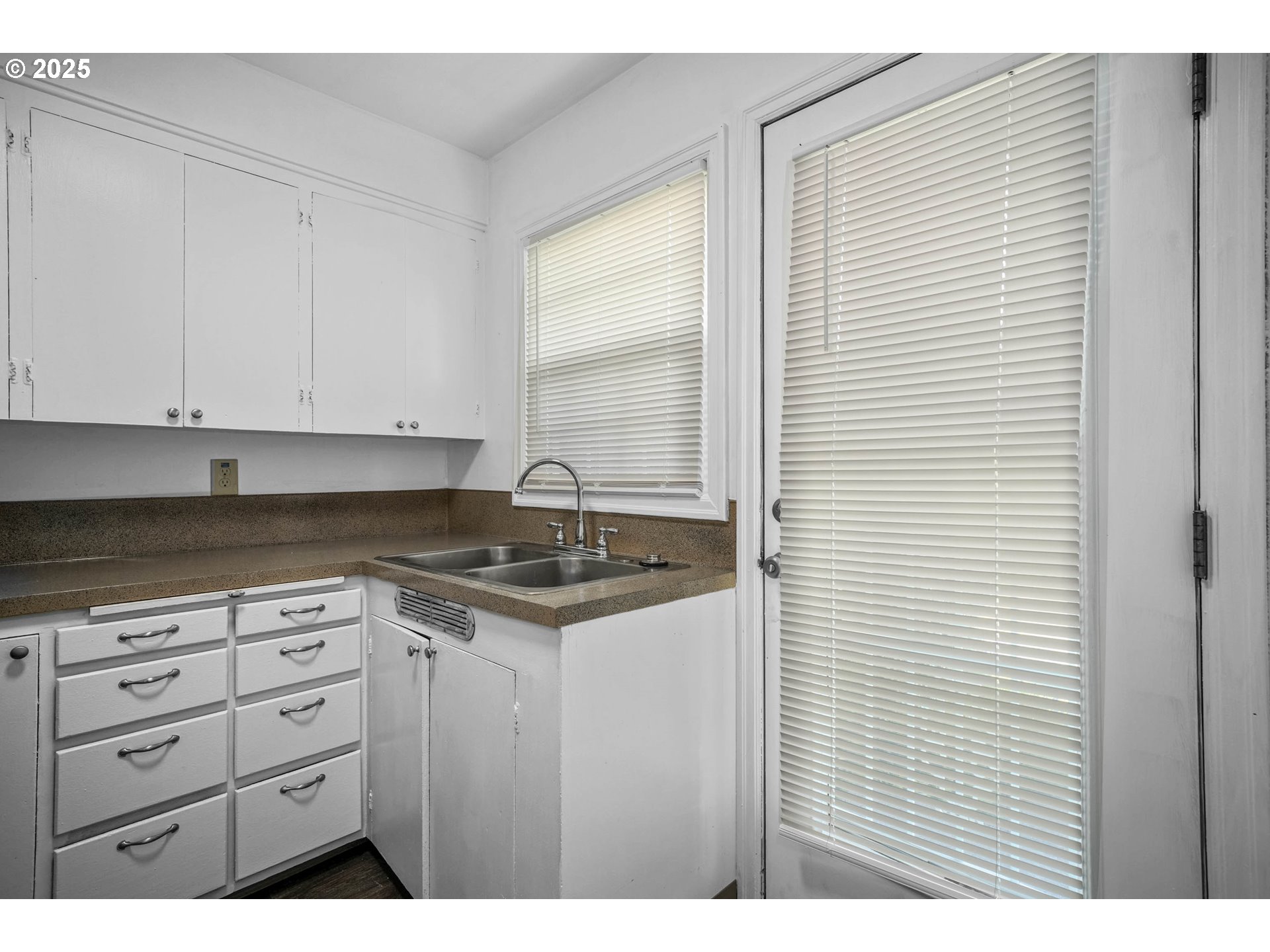 1908 Northeast 72nd Avenue Portland, OR 97213 - Photo 20 of 45 a kitchen with a sink and cabinets