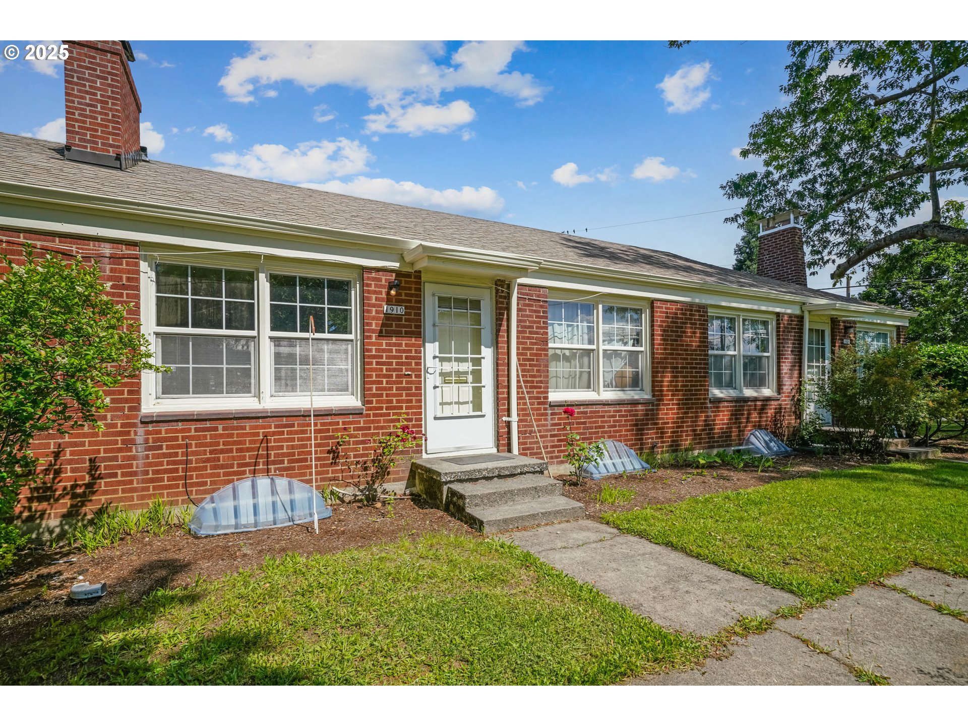 1908 Northeast 72nd Avenue Portland, OR 97213 - Photo 2 of 45 front view of a house with a yard