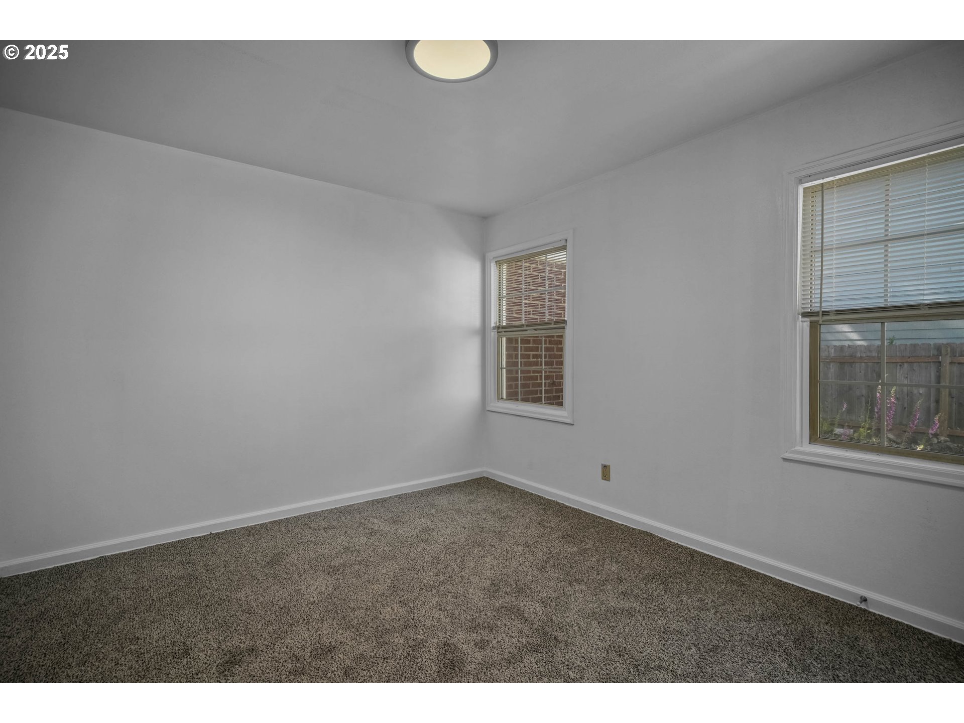 1908 Northeast 72nd Avenue Portland, OR 97213 - Photo 22 of 45 a view of an empty room with a window
