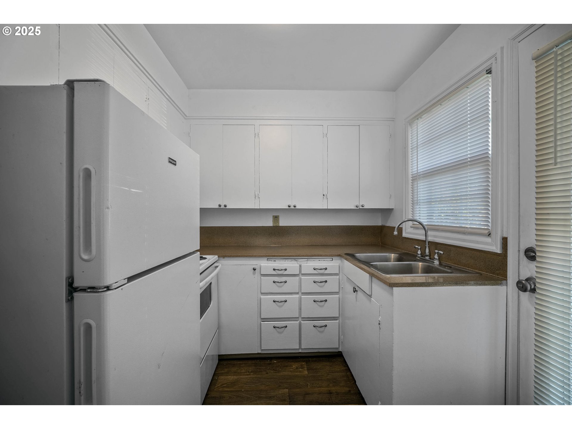 1908 Northeast 72nd Avenue Portland, OR 97213 - Photo 25 of 45 a kitchen with a sink a stove and refrigerator