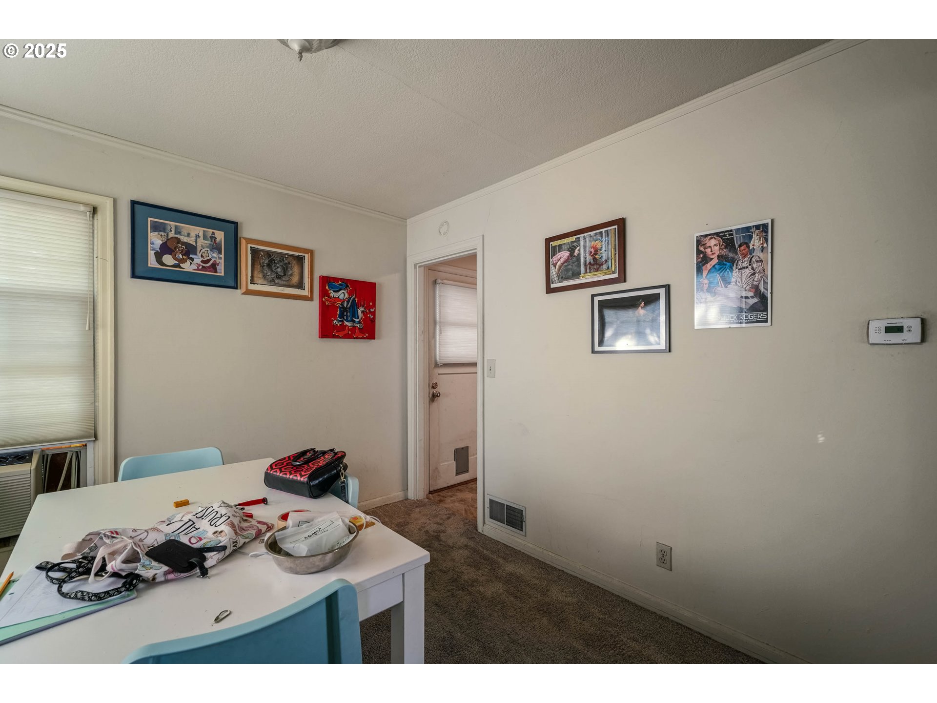 1908 Northeast 72nd Avenue Portland, OR 97213 - Photo 39 of 45 a bedroom with a bed and cabinets