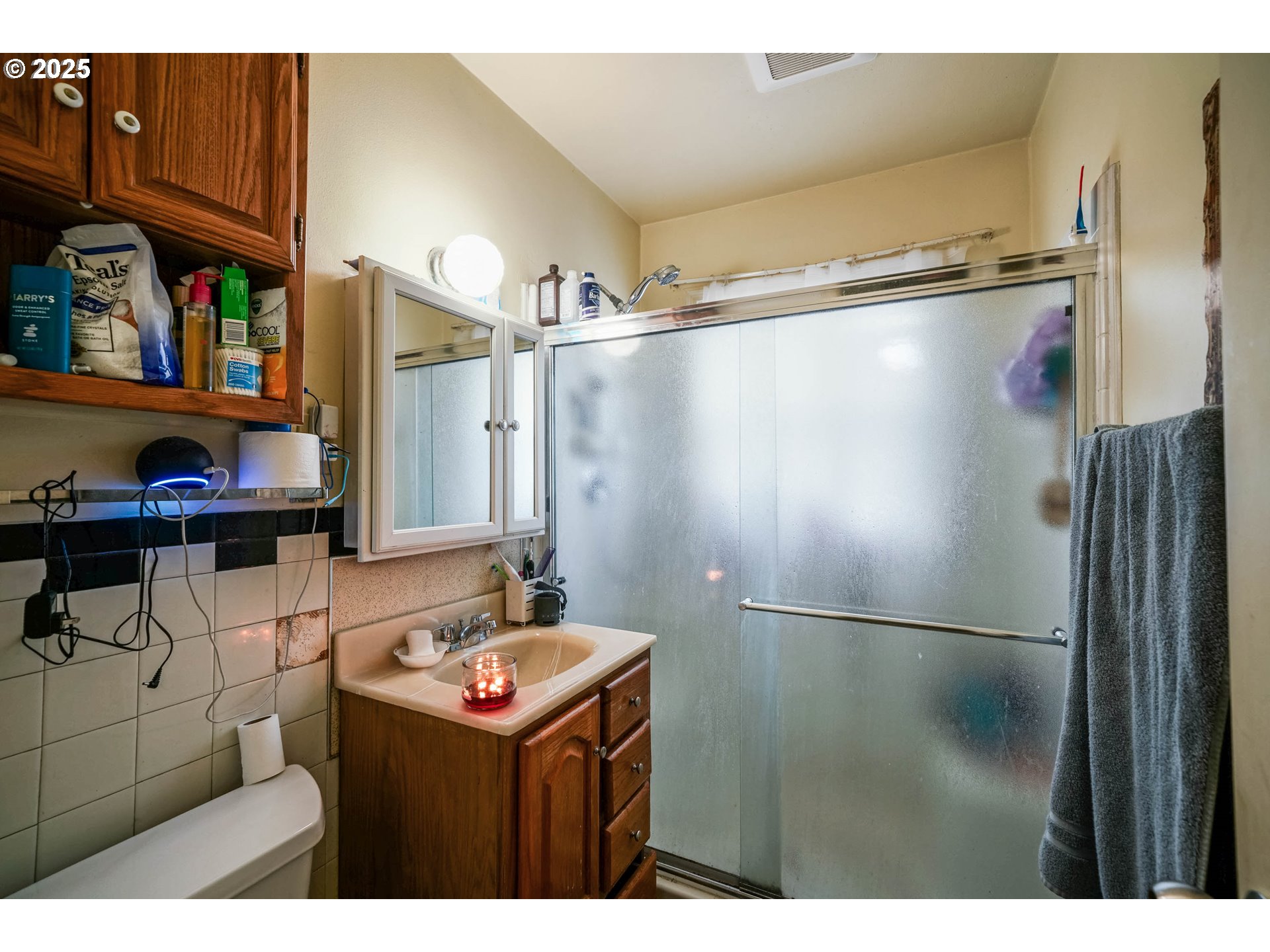 1908 Northeast 72nd Avenue Portland, OR 97213 - Photo 44 of 45 a bathroom with a sink mirror and cabinets