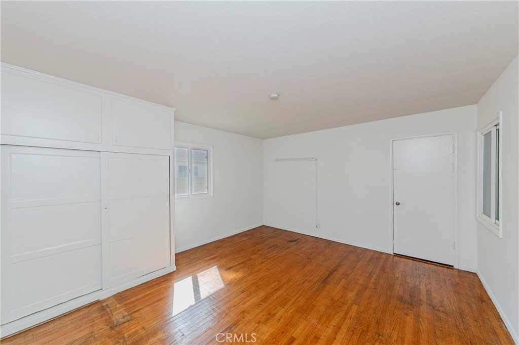 9002 Imperial Avenue Garden Grove, CA 92844 - Photo 13 of 20 a view of empty room with wooden floor