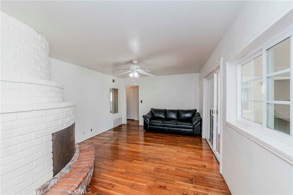 9002 Imperial Avenue Garden Grove, CA 92844 - Photo 15 of 20 a living room with furniture and a fireplace