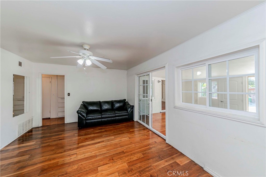 9002 Imperial Avenue Garden Grove, CA 92844 - Photo 16 of 20 a living room with furniture and wooden floor