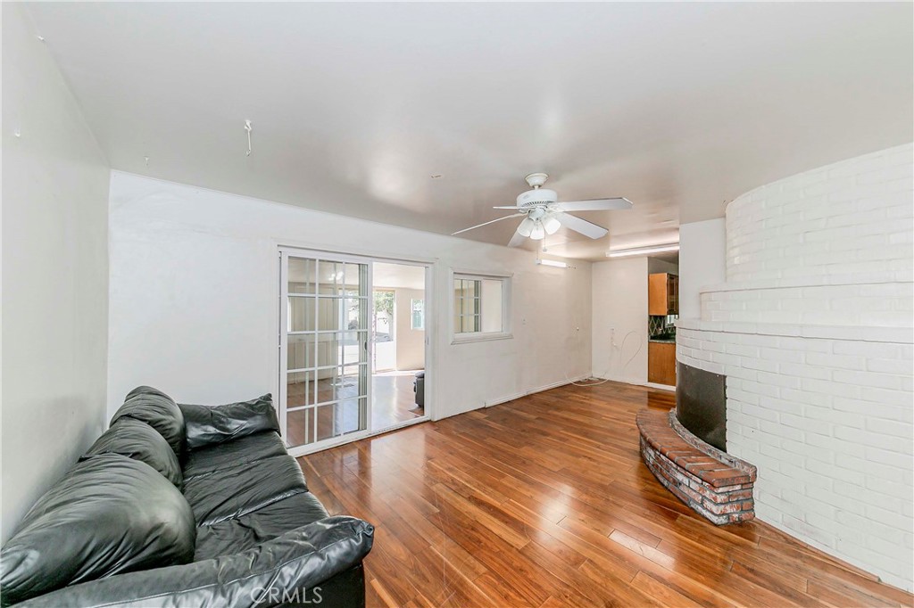 9002 Imperial Avenue Garden Grove, CA 92844 - Photo 17 of 20 a living room with furniture and a chandelier