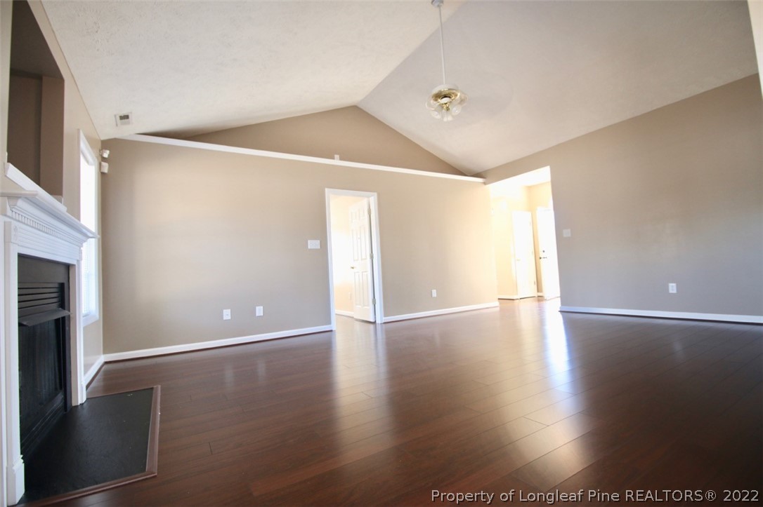 2004 Ivey Commons Road Fayetteville, NC 28306 - Photo 10 of 21 a view of an empty room with wooden floor