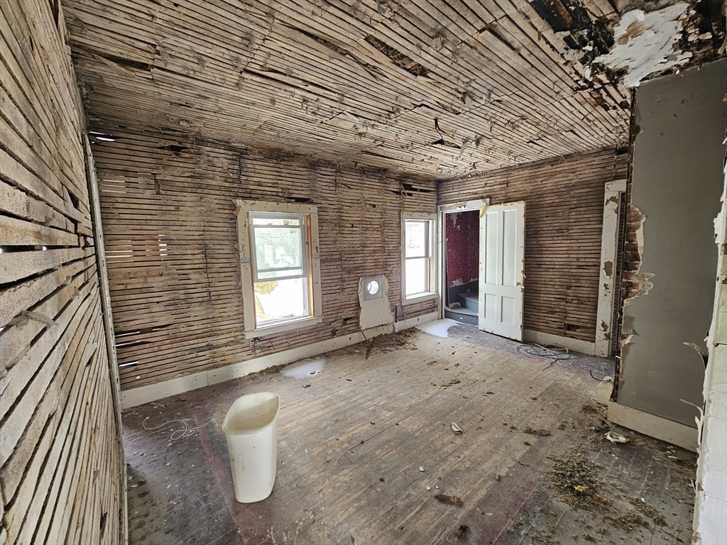 56 Liberty Street North Adams, MA 01247 - Photo 11 of 32 a view of a room with brick walls