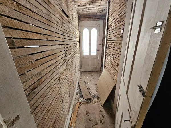 a view of a balcony with chairs