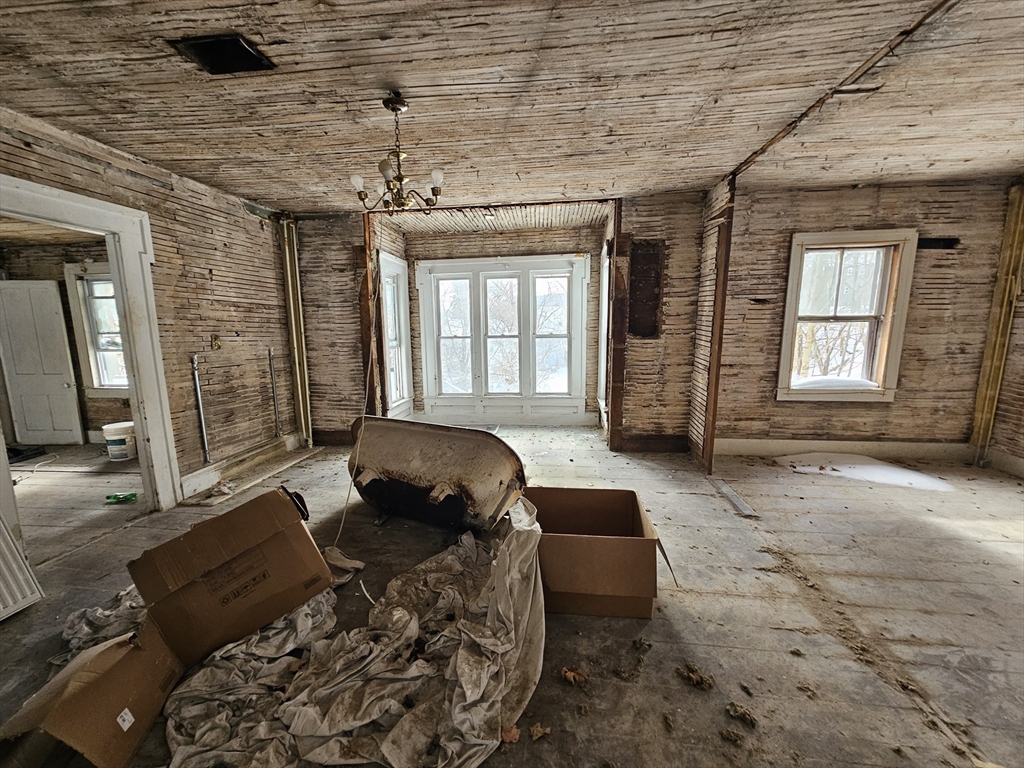56 Liberty Street North Adams, MA 01247 - Photo 23 of 32 a living room with furniture and a window