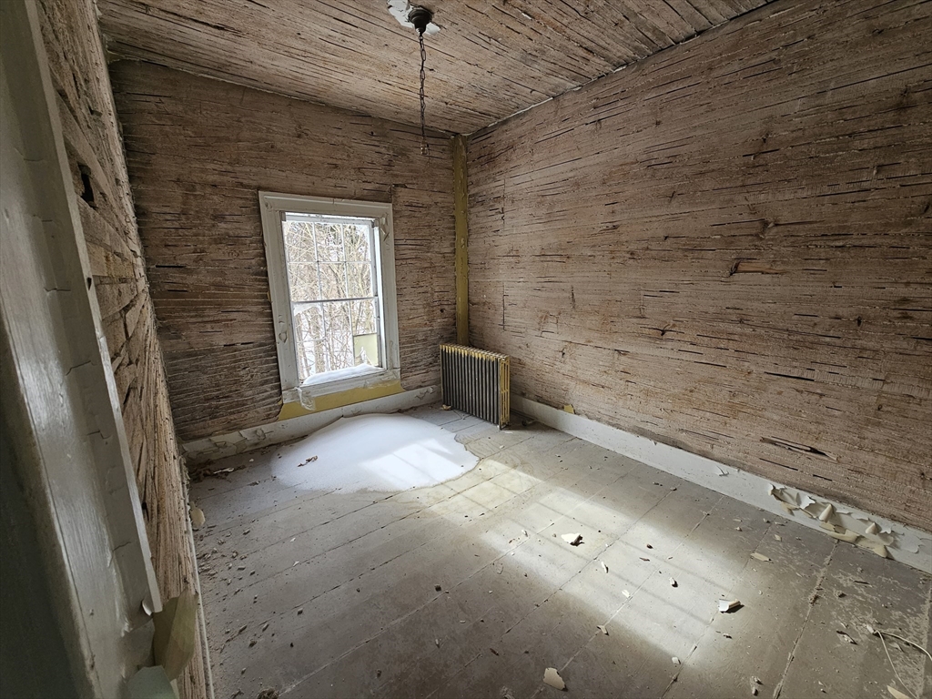 56 Liberty Street North Adams, MA 01247 - Photo 4 of 32 a view of empty room with window