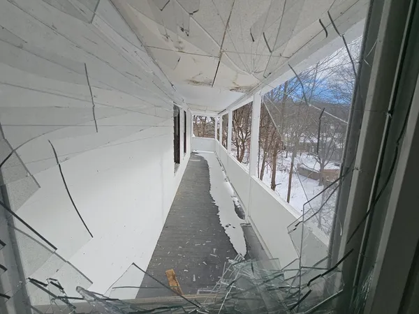 a view of entryway with wooden floor