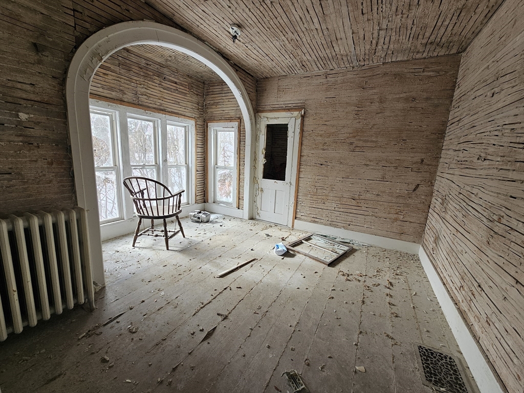 56 Liberty Street North Adams, MA 01247 - Photo 8 of 32 a view of entryway with wooden floor