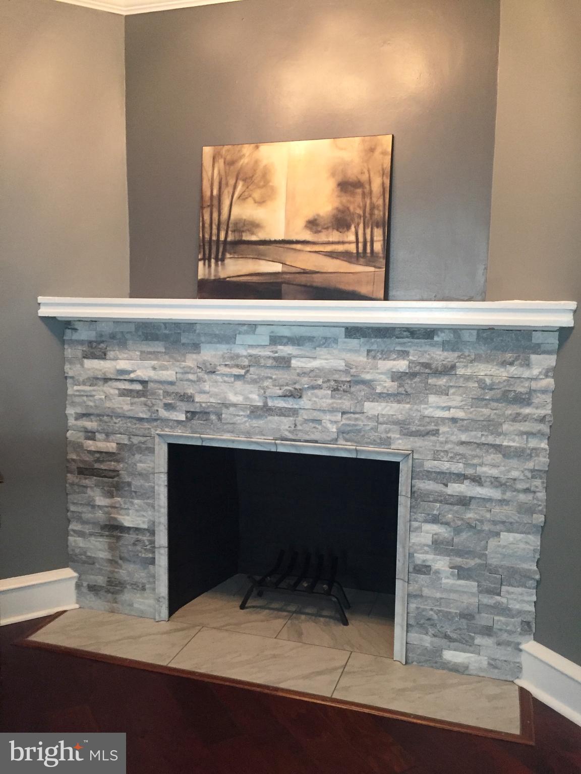 232 Sedgewood Road Springfield, PA 19064 - Photo 9 of 37 stunning refinished stone fireplace