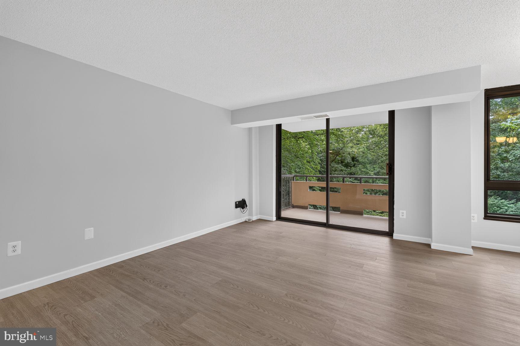1808 Old Meadow Road, Unit 601 McLean, VA 22102 - Photo 5 of 19 Living Room with New Sound Proof Windows