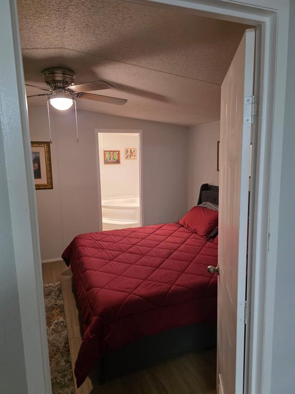 115 Yates Circle Aledo, TX 76008 - Photo 28 of 31 a bedroom with a bed and a window