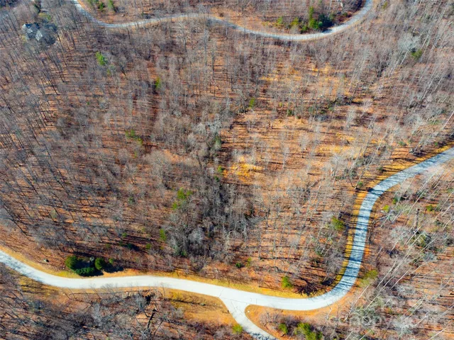 a view of a backyard of the house
