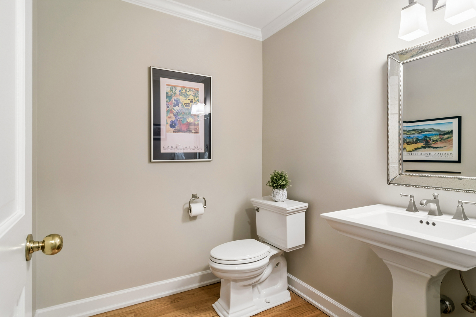23466 West Redwing Place Barrington, IL 60010 - Photo 11 of 35 a white toilet sitting next to a bathroom sink