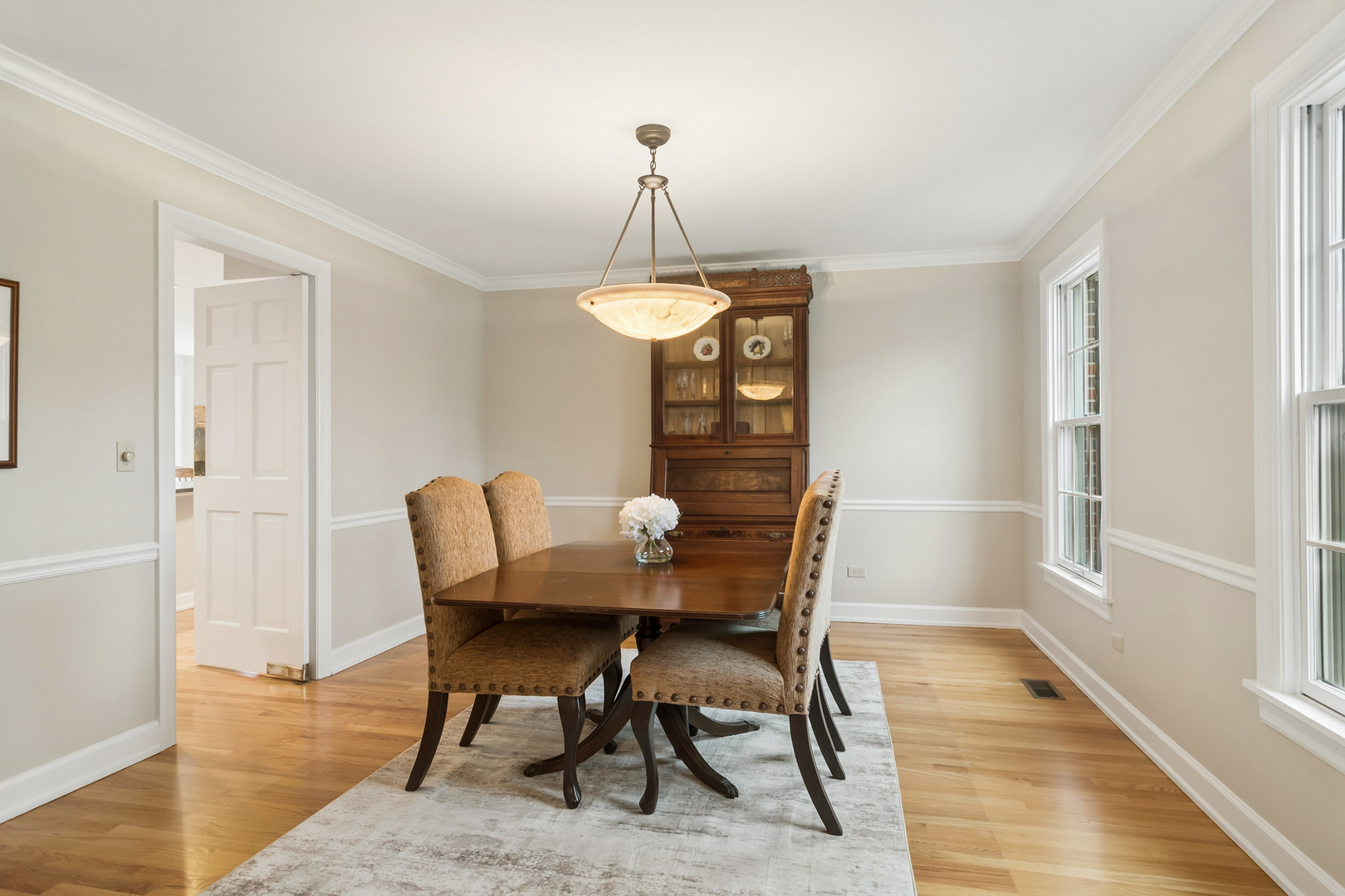 23466 West Redwing Place Barrington, IL 60010 - Photo 12 of 35 a view of a dining room with furniture window and wooden floor