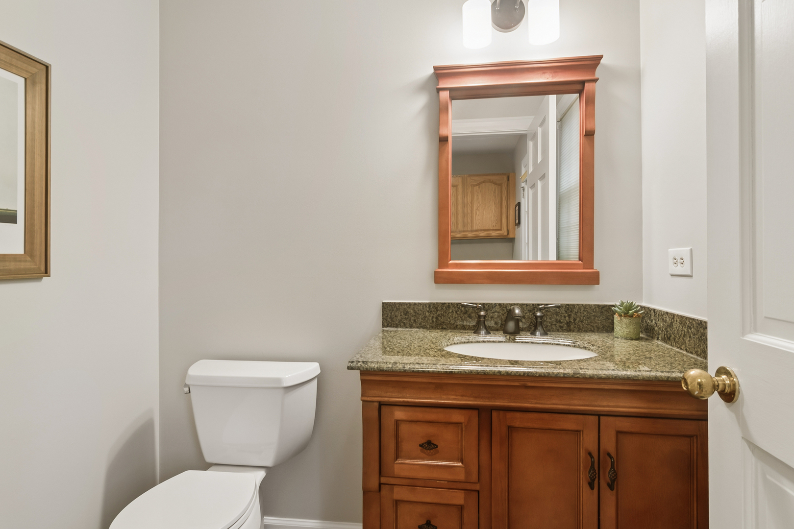 23466 West Redwing Place Barrington, IL 60010 - Photo 19 of 35 a bathroom with a sink and a toilet