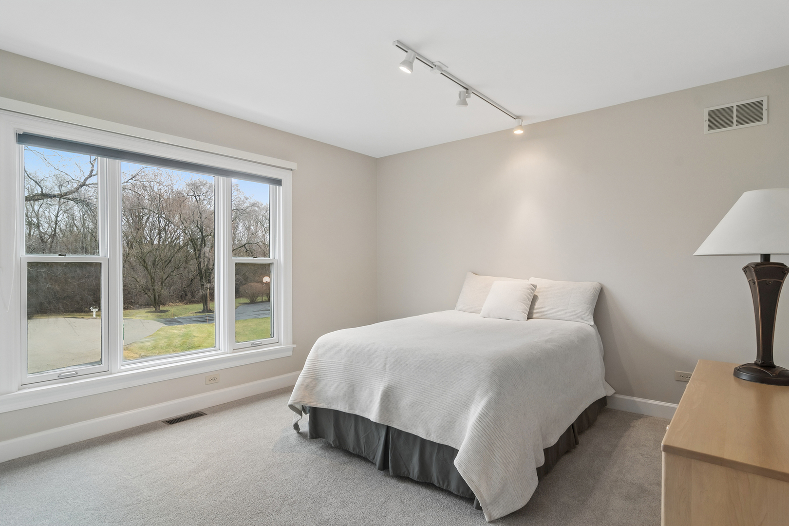 23466 West Redwing Place Barrington, IL 60010 - Photo 20 of 35 a bedroom with a bed and a large window