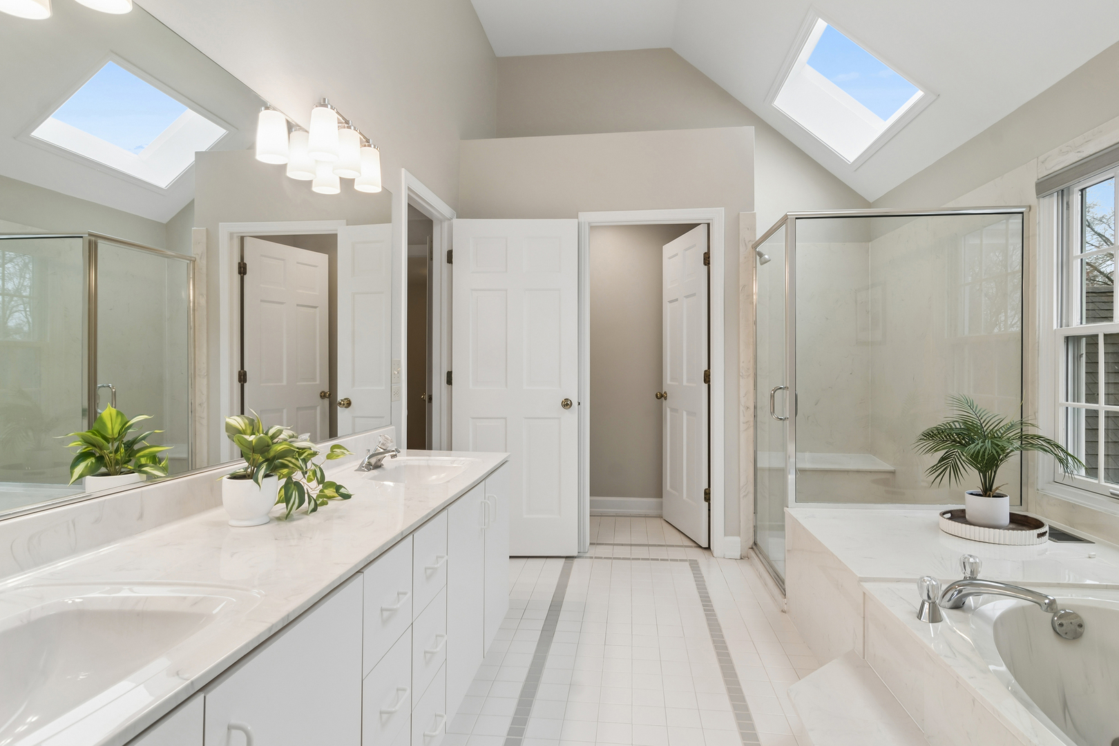 23466 West Redwing Place Barrington, IL 60010 - Photo 25 of 35 a spacious bathroom with a double vanity sink and a bathtub