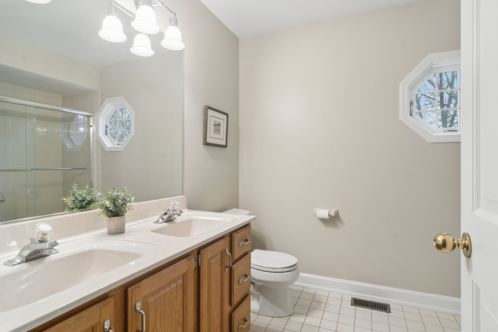 23466 West Redwing Place Barrington, IL 60010 - Photo 26 of 35 a bathroom with a granite countertop sink mirror vanity and toilet